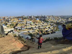 A Rohingya refugee child climbs stairs at Hakimpara refugee camp in Bangladesh's Ukhia district on Jan. 27, 2018 (AFP)