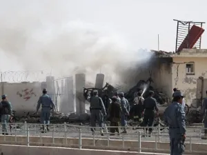 Afghan police inspect a suicide car bombing of the police chief's office in Lashkar Gah in Helmand province. Image used for illustrative purposes. (AFP/File)
