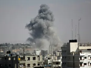 Smoke rises following an Israeli strike (AFP/File Photo)