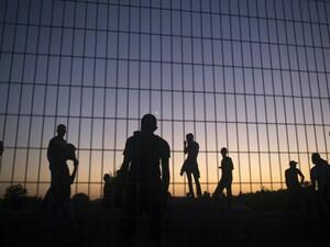 Palestinian protesters clash with Israeli soldiers near the border fence between Israel and the Gaza Strip (AFP/File Photo)	