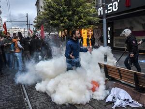 Demonstrators clash with riot police in Turkey's capital, Istanbul. (AFP) Demonstrators clash with riot police in Turkey's capital, Istanbul. (AFP)