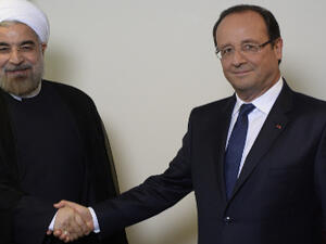 The French will not budge from their republican traditions to accommodate the Iranian Islamic dining customs. (AFP/File) 