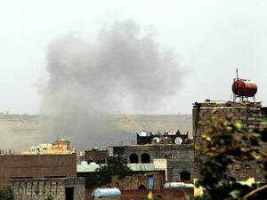 Smoke rises above the military academy in the Yemeni capital Sanaa on April 11, 2015, following an alleged air strike by the Saudi-led alliance on Shiite Houthi rebels camps. (AFP/File)