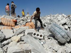 Damage from a U.S.-led airstrike in a northwestern Syrian village, September 2014.  (AFP/Sami Ali)