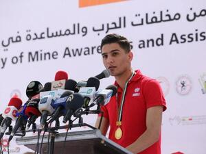 Assaf making a speech during the International Day of Mine Awareness & Assistance in Mine Action in Gaza. (Image: Facebook)