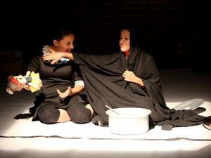 Teenage girls perform at a drama therapy workshop in Baghdad on October 1, 2015.  (AFP/File)