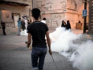 Tear gas rises after police clash with Bahraini protesters in February 2014. (AFP/File)