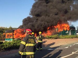 Photos on social media show the bus engulfed in flames. (Twitter)