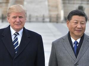 US President Donald Trump (L) and Chinese President Xi Jinping pose at the Forbidden City in Beijing.(AFP/File)