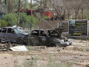 The remains of a car bomb. (AFP/Younis al-Bayati)