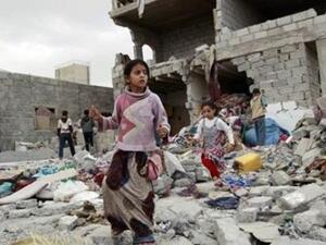 Children Stand on a bombed building in Yemen (AFP/File Photo)	