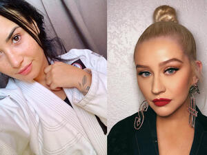 Demi Lovato showed off her strength (Source : xtina , ddlovato / Instagram ) 