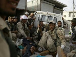 Fighters from Syria's Manbij military council sit in a truck on the outskirts of the northern town of Manbij before another battle with Daesh militants. (AFP/File)
