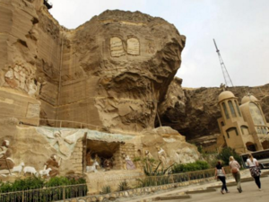 People walk near a popular Coptic church in Cairo. (AFP/File)