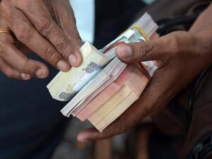 When you are an Abu Dhabi overnight 'Big Ticket' millionaire you can afford to take time to count your money (AFP/File Photo)	