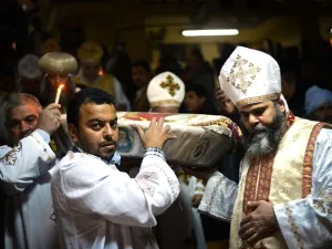 Egyptian Coptic Christian religious leaders celebrate Christmas in the monastery of Saint Samaan in Cairo on Jan. 6, 2015 (AFP)