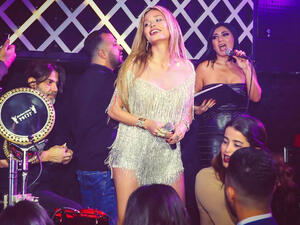 During her latest New Year's on stage performance Dominque lost balance and fell on stage. (Source: dominiquehourani - Instagram)