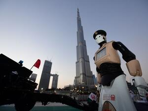 The world's first operational police robot stands at attention in Downtown Dubai on May 31, 2017. (AFP) The world's first operational police robot stands at attention in Downtown Dubai on May 31, 2017. (AFP)