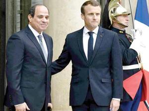 French President Emmanuel Macron (R) and Egyptian President Abdel Fattah al-Sisi ahead of talks at the Élysée Palace in Paris. (AFP/ File Photo)