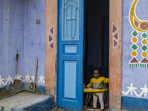 An Egyptian child looks out from the doorway of his family's home in Gharb Aswan village, near Aswan, 900 kilometres south of the capital Cairo. (AFP/File)