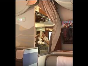 Emirates is so poor that its flight attendants have to pour drinks back into their bottles. (YouTube)