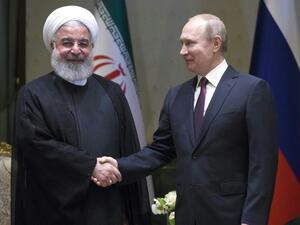 Rouhani and Putin were in Ankara for the summit with Erdogan (AFP/File Photo)