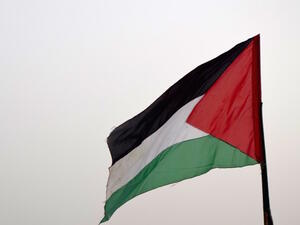 Palestinian flags and flags of the Fatah movement, with which Atallah was affiliated, were waved (AFP/File)