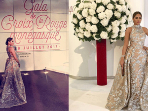 تألقت فوز بفستان ملكي باللون الذهبي طويل ذي تنورة ضخمة مزينة كلياً بالزخارف