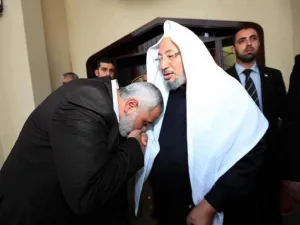 دعوة القرضاوي لغزة تشكل استخداما لسلاح الدين من جانب حماس