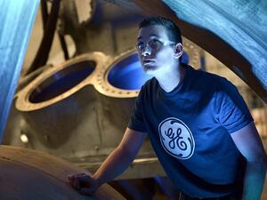 A worker looks at the 9HA Gas Turbine, at the General Electric (GE) plant in Belfort, France, on May 28, 2015. (AFP/ Frederick Florin) A worker looks at the 9HA Gas Turbine, at the General Electric (GE) plant in Belfort, France, on May 28, 2015. (AFP/ Frederick Florin)