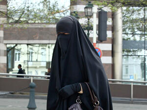 The decision can be overturned by the beginning of the new school year, as there are currently only three students who wear the niqab at AUC (AFP/File)