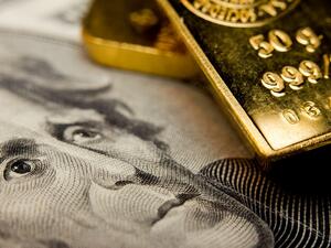 Gold hits one-month peak as dollar drops on uncertainty surrounding new US tax code. (Shutterstock) Gold hits one-month peak as dollar drops on uncertainty surrounding new US tax code. (Shutterstock)