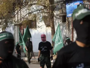 Palestinian Hamas militants rally in the streets of the Bureij refugee camp in central Gaza Strip on Dec. 25, 2009. (AFP/Mohammed Abed)