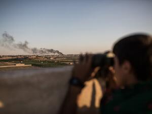 Kurdish fighters are pictured during clashes with fighters from Daesh on the outskirts of the Syrian city of Hasakah on June 30, 2015. (AFP/Uygar Onder Simsek)