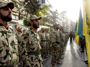 Hezbollah fighters Wednesday seized 15 positions from militants on the outskirts of a volatile northeastern border town. (AFP/File)