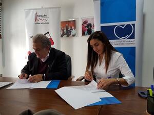 جانب من توقيع الاتفاقية