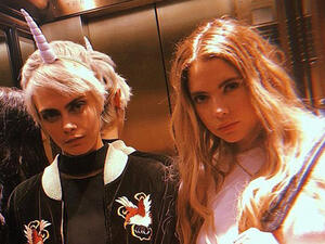 Cara and Ashley were spotted passionately kissing at Heathrow Airport  (Source: Ashleybenson / Instagram )