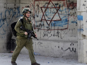 An Israeli soldier in Hebron. (AFP photo) 