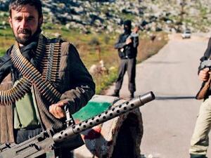 Syrian rebels man a checkpoint in northern Syria's Idlib region. (AFP/File)