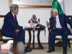 Palestinian President Mahmoud Abbas holds a meeting with US Secretary Of State John Kerry on December 5, 2013 in Jerusalem, Israel. 