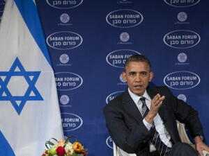 US President Barack Obama speaks about US, Iran and Israel and the Middle East at the 10th Anniversary Saban Forum hosted by the Saban Center for Middle East Policy at Brookings Institution in Washington, DC, December 7, 2013. [AFP]