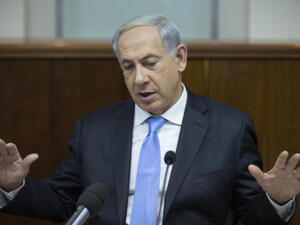 Israel's Prime Minister Benjamin Netanyahu chairs the weekly cabinet meeting on December 8, 2013 in Jerusalem, Israel. [Getty Images]
