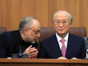 Head of Iran's Atomic Energy Organisation Ali Akbar Salehi (L) and International Atomic Energy Agency (IAEA) Director General Yukiya Amano, take part in a press conference in Tehran. (Image credit: AFP)