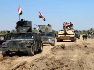 Iraqi Counter Terrorism Forces drive their armored vehicles after they retook an area from Daesh on April 2, 2016 in Anbar province. (AFP/Moadh al-Dulaimi)