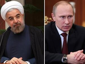 This combination of two recent pictures made on January 9, 2014 shows (at L) Iranian president Hassan Rouhani in Tehran in a picture released by the Iranian Presidency and Russian President Vladimir Putin in Moscow. [AFP]