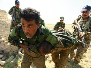 Shi´ite militia (pictured below) supported the Iraqi security forces to retake the town of Amerli (Haidar Hamdani/ AFP).
