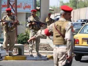 حاجز تفتيش للجيش العراقي على أحد التقاطعات
