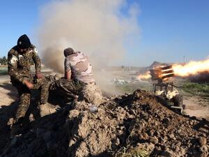 Fighters from the pro-government Popular Mobilization units set off a rocket launcher outside of Kirkuk, as they try to recapture the village of al-Bashir from Daesh on February 16, 2016. (AFP/Mohammed Sawaf)