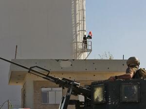 Iraqi soldiers guard an oil facility  (AFP/File Photo)	
