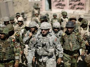 Iraqi and American troops are seen on patrol in Mosul. (AFP/File)